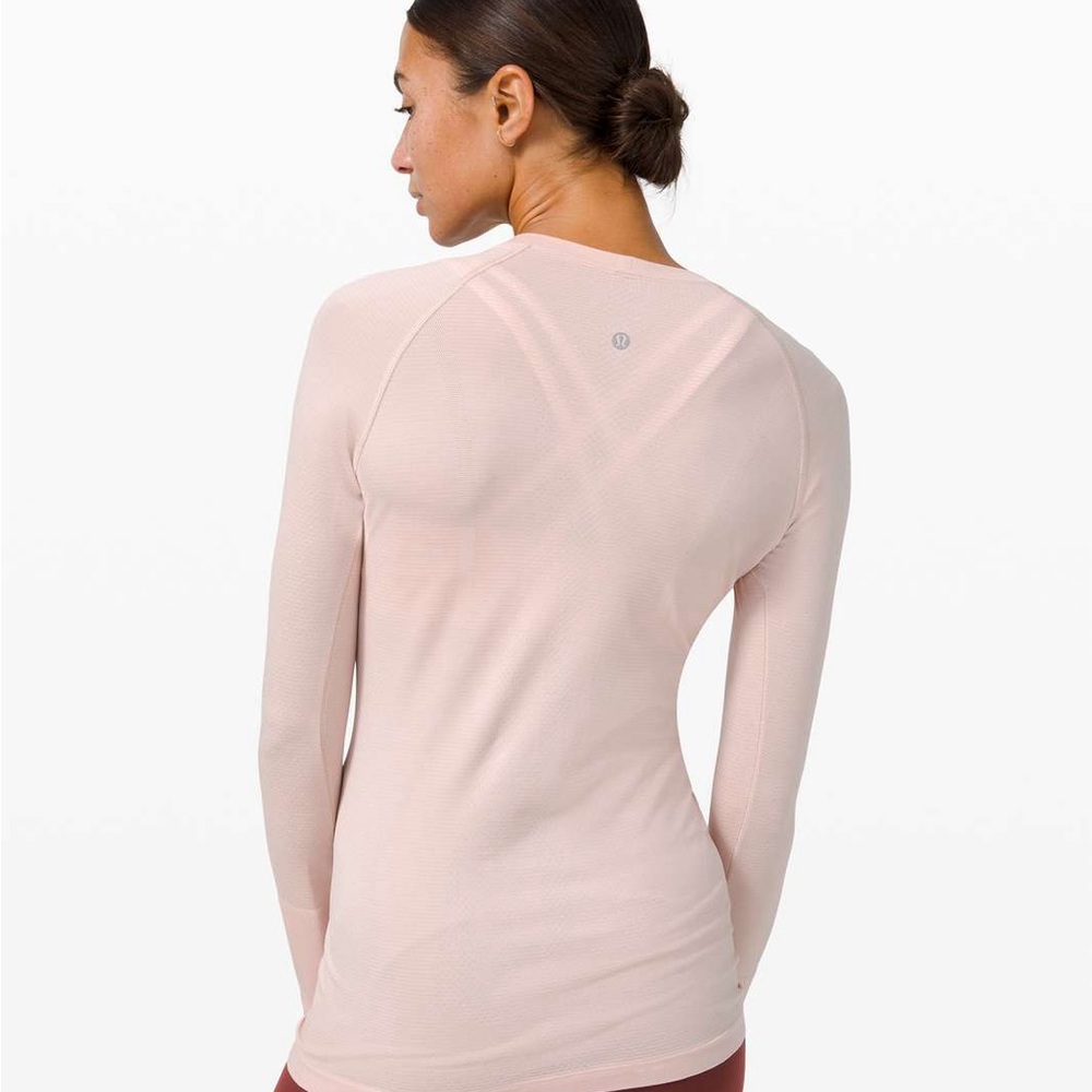 Lululemon light pink swiftly long sleeve top in size 14 EUC